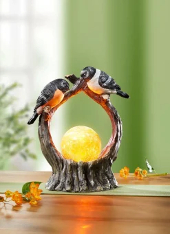 Beleuchtete Dekoration mit Vögel