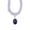 Vergoldeter Anhänger mit Lapislazuli