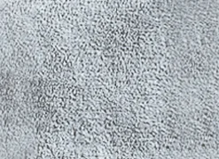 Wohndecke und Sesselschoner mit Fransenabschluss