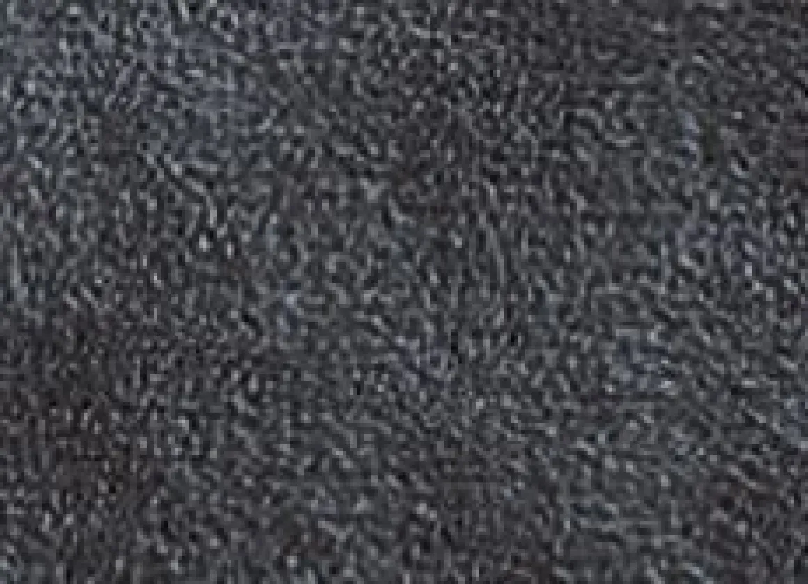 Wohndecke und Sesselschoner mit Fransenabschluss
